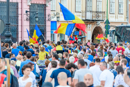 Brasov - Romania, 10 August 2018: Thousands of Romanians living in Brasov support the Diaspora anti-government protest to take place in Bucharest on Friday. Over 4 milion Romanians are living abroad due the corruption, low wages and lack of opportunities.のeditorial素材