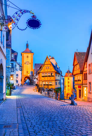 Rothenburg ob der Tauber, Bavaria, Germany - Beautiful postcard view of Ploenlein with Siebers Tower and Kobolzell Gate, famous historic town.のeditorial素材
