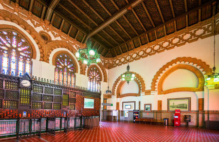 Toledo, Spain - November 2022. Toledo railway station is a historic transportation hub located in the heart of old city, built in Neo-Mudejar style.のeditorial素材