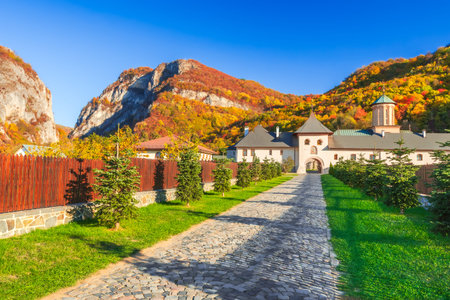 Oltenia, Romania. Polovragi Monastery  in Gorj county, Orthodox Church travel destination, autumn...