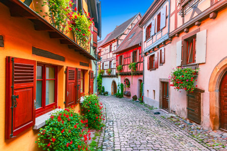 Eguisheim, France. Charming Alsace village, features colorful half-timbered houses, cobblestone streets, vineyards and medieval charm.の写真素材