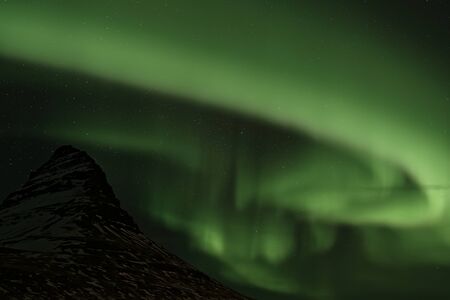 Northern Lights swirling around Kirkjufell, Grundarfjordur, Icelandの写真素材