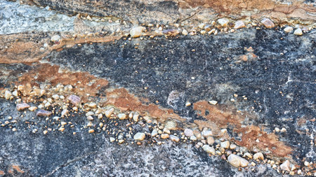 Pebbles caught in rockwall, Bungle Bungles/Purnululu National Park, Western Australia, Australia
