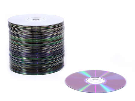 isolated pile of cds and dvds vs. one discの写真素材