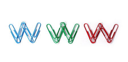 colored paper clips arranged inの写真素材