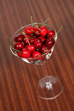 a glass of cherriesの写真素材