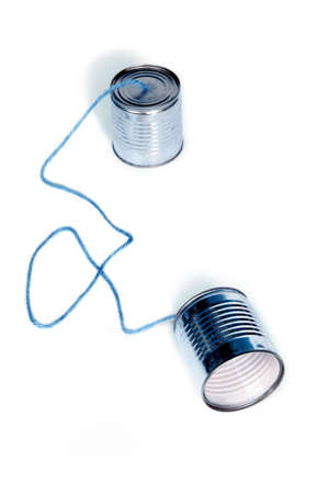 ancient communication - cans connected by stringの写真素材