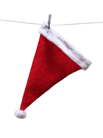 Getting ready for the holidays - Santa hat hangingの写真素材