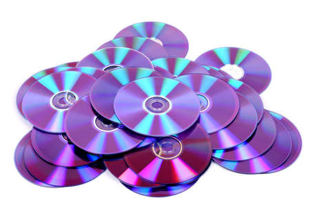 lots of cd or dvd on white backgroundの写真素材