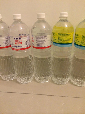 Water bottles at wall
