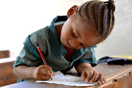 African Student Writing - Schoolgirlのeditorial素材