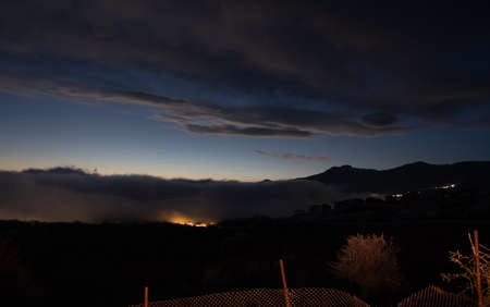Mountains and Hills panoramic view of the landscape. villages and foggy area. evening view.の写真素材