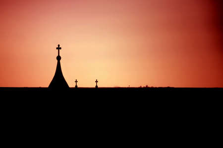 A church silhouette against sunset sky, exteriorの写真素材