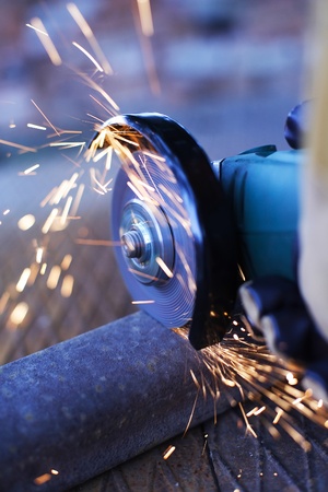 Angle grinder cutting steelの写真素材