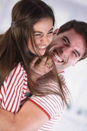 Couple laughing and having fun の写真素材