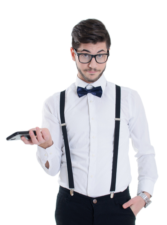 Surprised young man looking at mobile phoneの写真素材