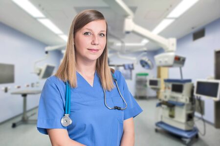 Woman doctor smiling and looking to the cameraの写真素材