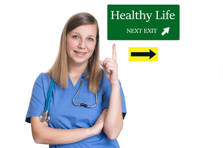 Female doctor pointing up one finger to Healthy lifeの写真素材