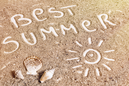 The Word Best Summer Written in the Sandの写真素材