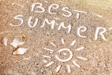 The Word Best Summer Written in the Sandの写真素材
