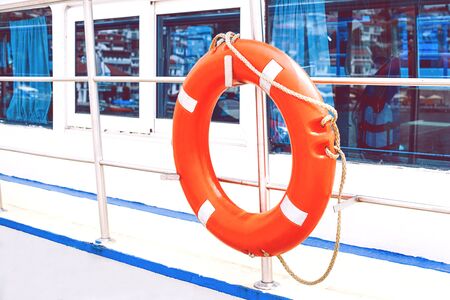 Lifebuoy for a lifeguard to save people from drowning, put on the boatの写真素材