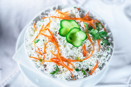 Feta cheese salad with fresh greensの写真素材