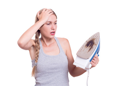 Shocked Woman With Burned Ironの写真素材