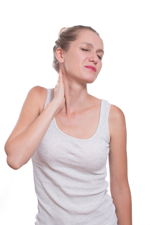 Woman with neck pain, isolated on white backgroundの写真素材