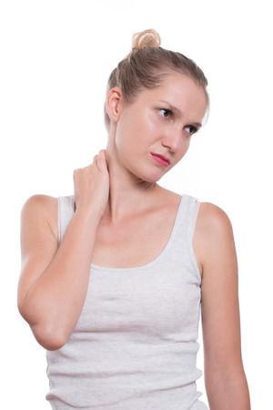 Woman with neck pain, isolated on white backgroundの写真素材