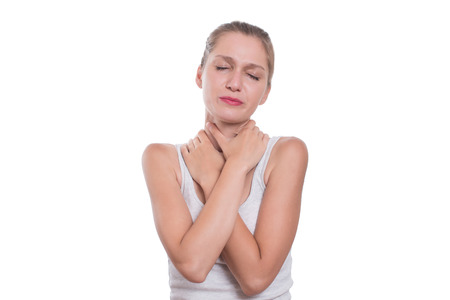 Woman suffering from sore throat, isolated on white backgroundの写真素材