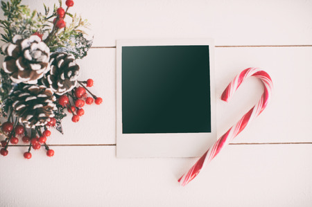 Blank photo frames and Christmas decorの写真素材