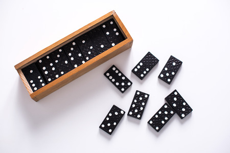 Dominoes on white surfaceの写真素材