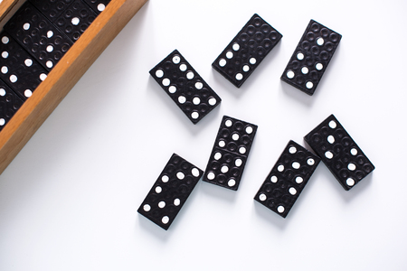 Dominoes on white surfaceの写真素材