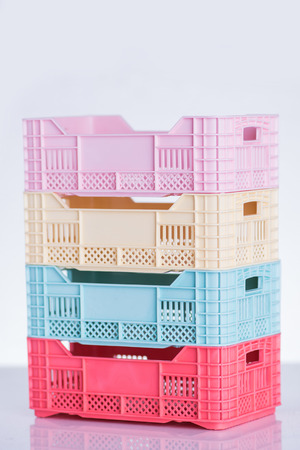 Pastel colored plastic cratesの写真素材