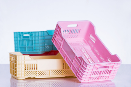 Pastel colored plastic cratesの写真素材