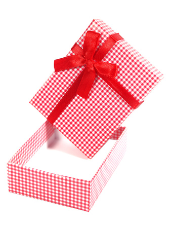 Open red and white checkered gift box, isolatedの写真素材