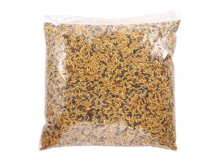 Packaged food for birds, mixture of seeds for small parrots, parakeetsの写真素材