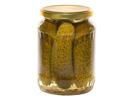 Pickles in a glass jar isolated on a white backgroundの写真素材