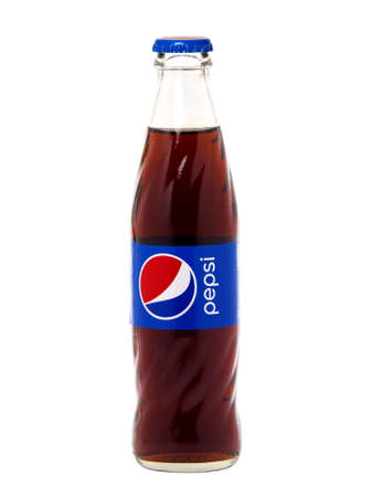 BUCHAREST, ROMANIA - DECEMBER 19, 2016. Pepsi glass bottle isolated on white background. Pepsi is a carbonated soft drink that is produced and manufactured by PepsiCoのeditorial素材