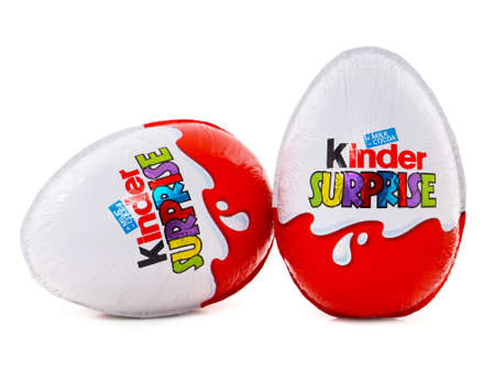 BUCHAREST, ROMANIA - FEBRUARY 24, 2016. Kinder Surprise chocolate egg with a small toy for children. Kinder Surprise eggs are manufactured by Italian company Ferreroのeditorial素材