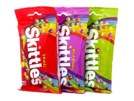 BUCHAREST, ROMANIA - MARCH 2, 2015. Skittles Candy isolated on white. Skittles is a brand of fruit flavored sweets, produced by the Wm. Wrigley Jr. Companyのeditorial素材
