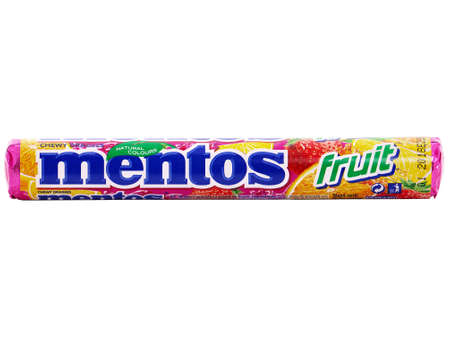 BUCHAREST, ROMANIA - APRIL 11, 2016. Mentos chewy dragees fruit. Mentos is produced by Perfetti Van Melleのeditorial素材