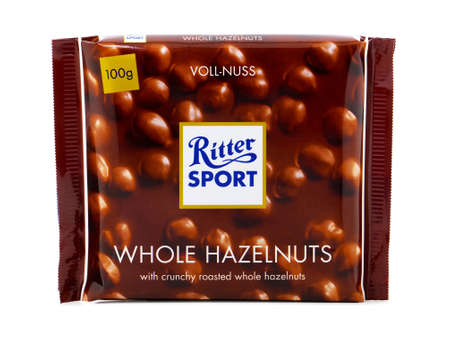 BUCHAREST, ROMANIA - MARCH 25, 2016. Ritter Sport Whole Hazelnuts, milk chocolate bar with whole hazelnuts made with natural ingredients. Ritter Sport is a brand of chocolate from the Alfred Ritter Gmのeditorial素材
