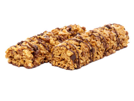 Chocolate glaze cereal bars isolated on whiteの写真素材