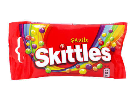 BUCHAREST, ROMANIA - MARCH 2, 2015. Skittles Candy isolated on white. Skittles is a brand of fruit flavored sweets, produced by the Wm. Wrigley Jr. Companyのeditorial素材