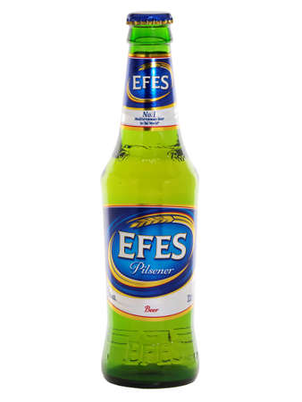 BUCHAREST, ROMANIA - MAY 29, 2015. Efes Pilsener glass bottle beer isolated on white, a brand owned by Efes Beverage Groupのeditorial素材