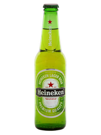 BUCHAREST, ROMANIA - MAY 29, 2015. Heineken glass bottle beer isolated on white. Heineken Lager Beer is a pale lager beer produced by the Heineken Internationalのeditorial素材