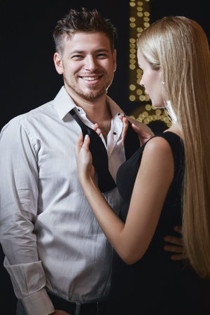 Love story of beautiful couple in studio. Sensual couple. Sequal couple. Couple in love. Man and...