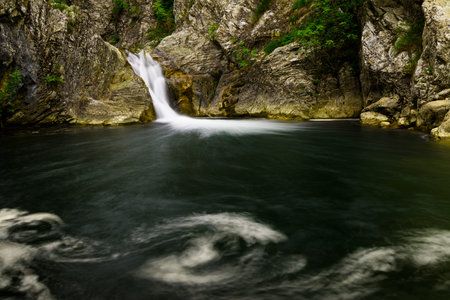 Sini Vir waterfall or The Blue Pool on Medven river near village of Medven, Bulgariaの写真素材