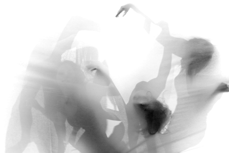 Group of contemporary dancers performing on stage の写真素材